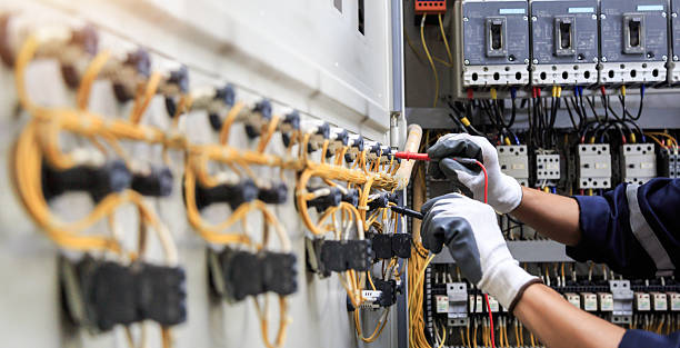 Professional Electrical Panel Upgrade technician working in Adams County County, WA